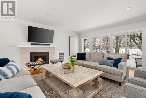 12598 Loyalist Pkwy, Prince Edward County, ON - Indoor Photo Showing Living Room With Fireplace