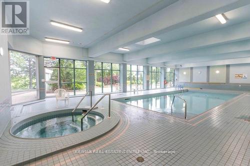 909 - 4450 Tucana Court, Mississauga, ON - Indoor Photo Showing Other Room With In Ground Pool