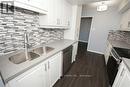 909 - 4450 Tucana Court, Mississauga, ON  - Indoor Photo Showing Kitchen With Double Sink 