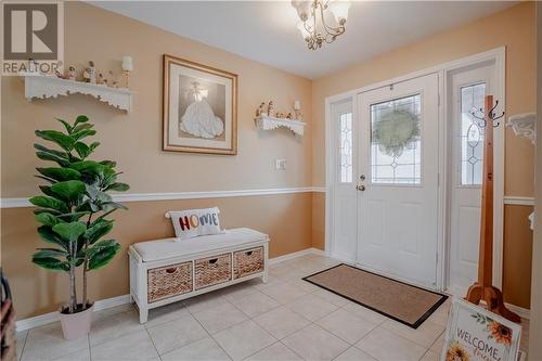 Bright foyer features a double coat closet. - 6540 Clifford Avenue, Cornwall, ON - Indoor Photo Showing Other Room