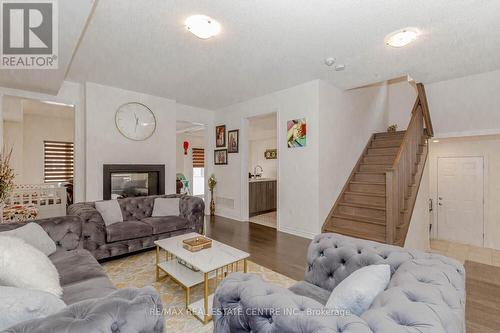 206 Doug Finney St, Oshawa, ON - Indoor Photo Showing Living Room With Fireplace
