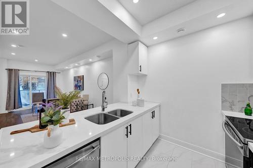 Th55 - 295 Village Green Square, Toronto, ON - Indoor Photo Showing Kitchen With Double Sink