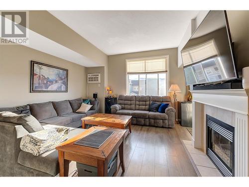 555 Houghton Road Unit# 321, Kelowna, BC - Indoor Photo Showing Living Room With Fireplace