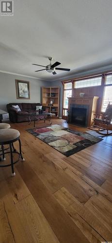 110 Tripp Road, Oxbow, SK - Indoor With Fireplace