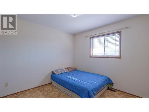 1584 Highway 33 E, Kelowna, BC - Indoor Photo Showing Bedroom