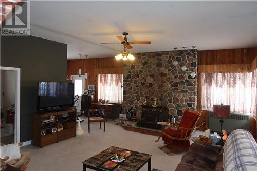 395 Sable St. E., Massey, ON - Indoor Photo Showing Living Room With Fireplace