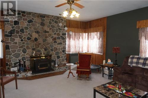 395 Sable St. E., Massey, ON - Indoor Photo Showing Other Room With Fireplace