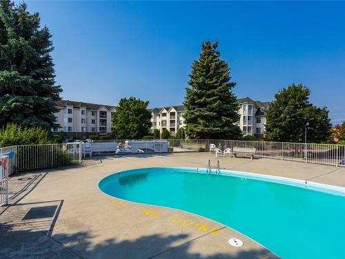 104-3163 Richter Street, Kelowna, BC - Outdoor With In Ground Pool