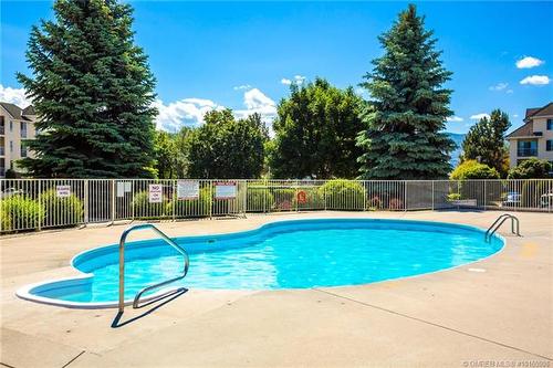 104-3163 Richter Street, Kelowna, BC - Outdoor With In Ground Pool With Backyard