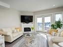505-747 Travino Lane, Saanich, BC  - Indoor Photo Showing Living Room With Fireplace 