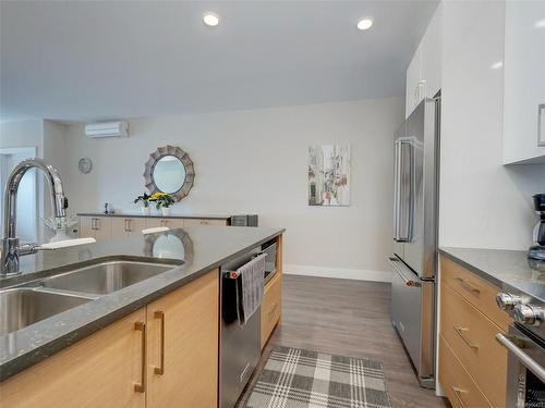 505-747 Travino Lane, Saanich, BC - Indoor Photo Showing Kitchen With Stainless Steel Kitchen With Double Sink