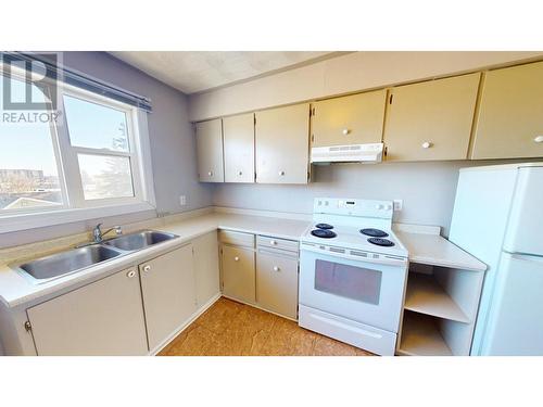 10203 98 Street, Fort St. John, BC - Indoor Photo Showing Kitchen With Double Sink