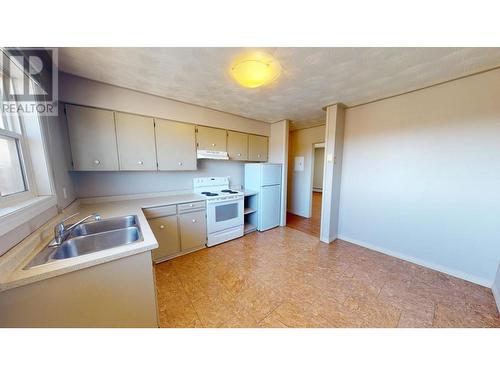 10203 98 Street, Fort St. John, BC - Indoor Photo Showing Kitchen With Double Sink