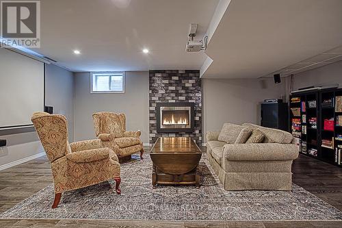 224 Boyd Blvd, Zorra, ON - Indoor Photo Showing Basement With Fireplace