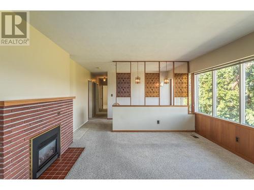 4729 Lakeshore Road, Kelowna, BC - Indoor With Fireplace