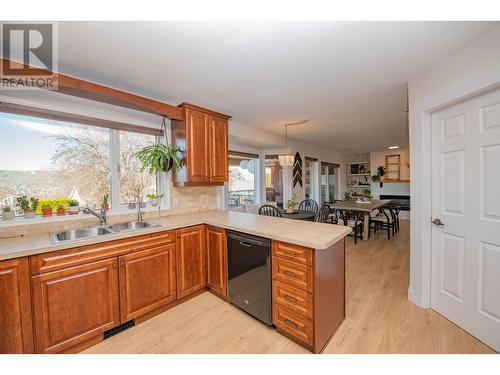 25 Lambert Place, Coldstream, BC - Indoor Photo Showing Kitchen With Double Sink