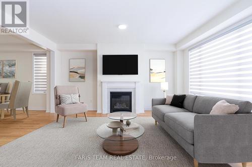 104 Durham Ave, Barrie, ON - Indoor Photo Showing Living Room With Fireplace