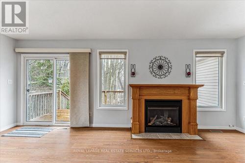 14 Carman St, Norwich, ON - Indoor Photo Showing Living Room With Fireplace