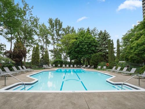 Pool - 302-50 Rue Berlioz, Montréal (Verdun/Île-Des-Soeurs), QC - Outdoor With In Ground Pool With Backyard