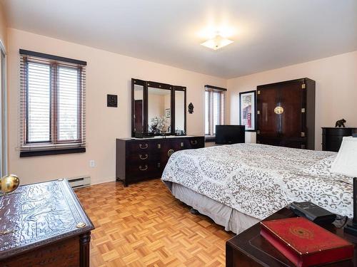 Master bedroom - 829 Rue Mousseau, Laval (Sainte-Dorothée), QC - Indoor Photo Showing Bedroom