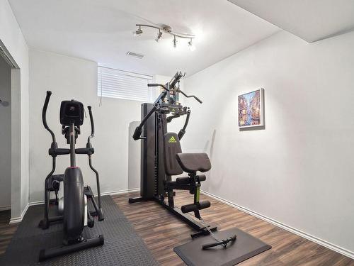 Chambre Ã Â coucher - 101 Rue Northview, Dollard-Des-Ormeaux, QC - Indoor Photo Showing Gym Room