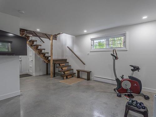 Basement - 251 Rue Du Lac-Marier, Sainte-Marguerite-Du-Lac-Masson, QC - Indoor Photo Showing Gym Room