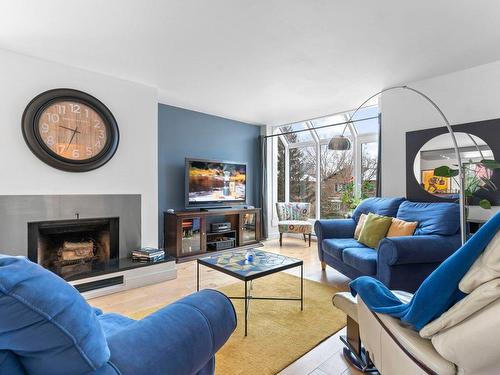 Living room - 205 Rue Terry-Fox, Montréal (Verdun/Île-Des-Soeurs), QC - Indoor Photo Showing Living Room With Fireplace