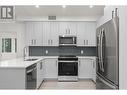 3434 Mckinley Beach Drive Unit# 209, Kelowna, BC  - Indoor Photo Showing Kitchen With Upgraded Kitchen 