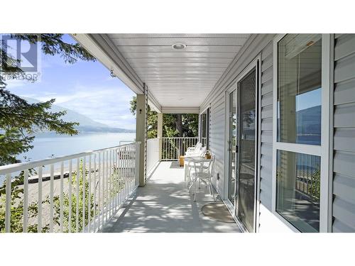 4746 Sunnybrae Canoe Point Road, Tappen, BC - Outdoor With Body Of Water With Exterior