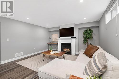 100 Palmer Drive, Kingsville, ON - Indoor Photo Showing Living Room With Fireplace