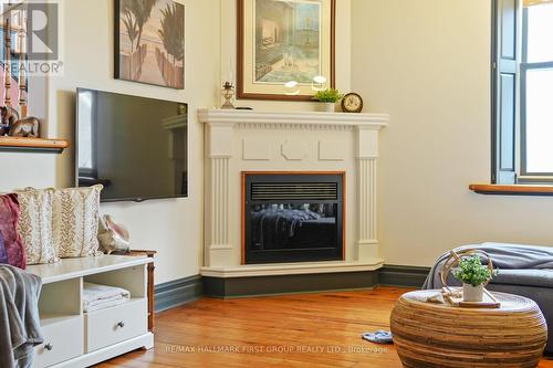 #2 -18 Chapel St, Cobourg, ON - Indoor Photo Showing Living Room With Fireplace