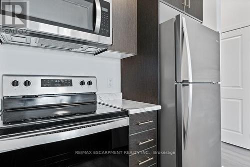 #407 -5055 Greenlane Rd, Lincoln, ON - Indoor Photo Showing Kitchen