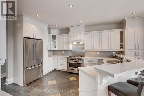 20 Cumberland Dr, Mississauga, ON - Indoor Photo Showing Kitchen With Double Sink