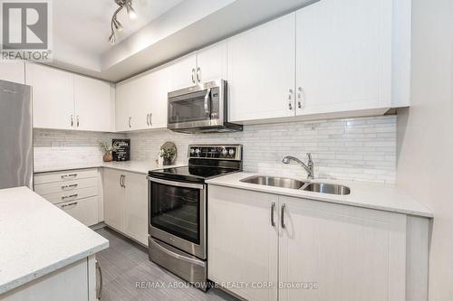 #4-01 -2420 Baronwood Dr, Oakville, ON - Indoor Photo Showing Kitchen With Stainless Steel Kitchen With Double Sink