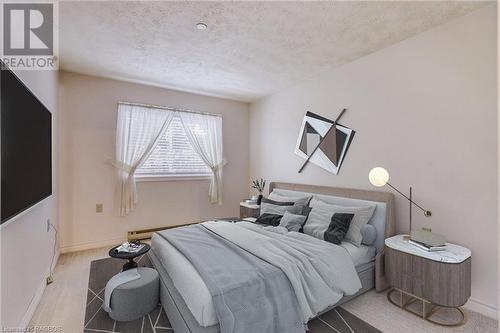 Virtually staged for illustrative purposes only - 1775 9Th Avenue E Unit# 406, Owen Sound, ON - Indoor Photo Showing Bedroom