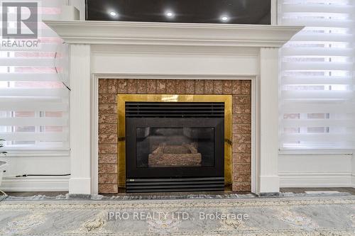 23 Elk Street, Brampton, ON - Indoor Photo Showing Living Room With Fireplace