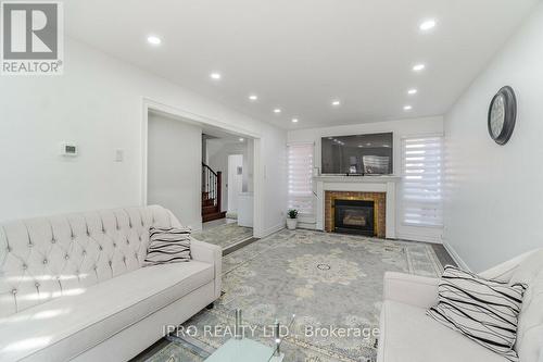 23 Elk Street, Brampton, ON - Indoor Photo Showing Living Room With Fireplace