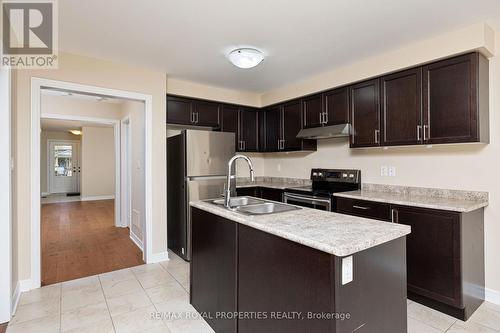68 Treetops Boulevard, New Tecumseth, ON - Indoor Photo Showing Kitchen With Double Sink