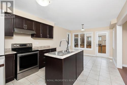 68 Treetops Boulevard, New Tecumseth, ON - Indoor Photo Showing Kitchen With Double Sink