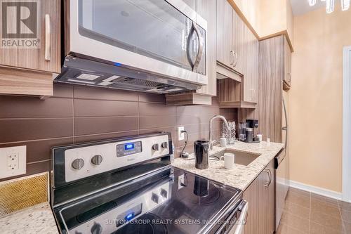 #Sw-105 -9191 Yonge St, Richmond Hill, ON - Indoor Photo Showing Kitchen With Upgraded Kitchen