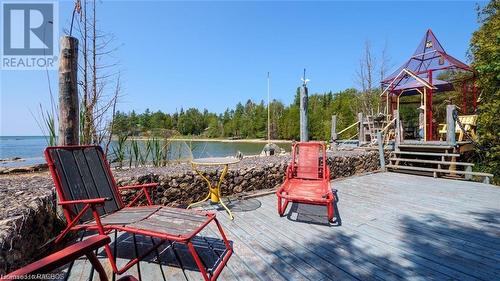 Great entertainment area on the water's edge - 7 Purgatory Road, Northern Bruce Peninsula, ON - Outdoor With Deck Patio Veranda