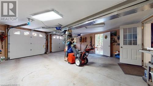 Oversized double car garage (24.5ft by 24ft) - SO much space! - 7 Purgatory Road, Northern Bruce Peninsula, ON - Indoor Photo Showing Garage