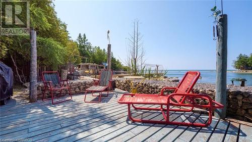 Over 600sqft of deck space by the water! - 7 Purgatory Road, Northern Bruce Peninsula, ON - Outdoor With Body Of Water With Deck Patio Veranda