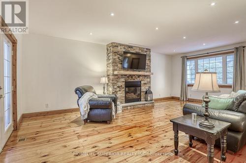 3795 Liberty St N, Clarington, ON - Indoor Photo Showing Living Room With Fireplace