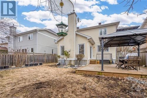 Extra deep & fully-fenced lot with large deck & gazebo for entertaining. - 22 Fernbrook Place, Kanata, ON - Outdoor With Deck Patio Veranda