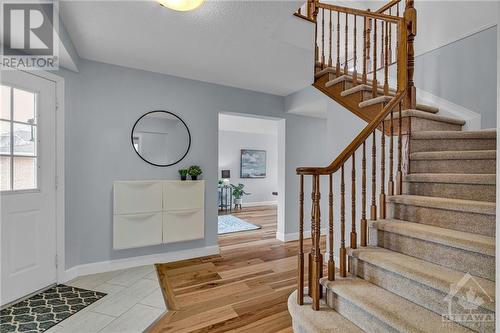 New hardwood throughout main - 22 Fernbrook Place, Kanata, ON - Indoor Photo Showing Other Room