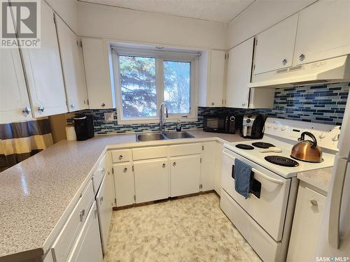 810 Healy Avenue, Radville, SK - Indoor Photo Showing Kitchen With Double Sink