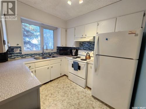 810 Healy Avenue, Radville, SK - Indoor Photo Showing Kitchen With Double Sink