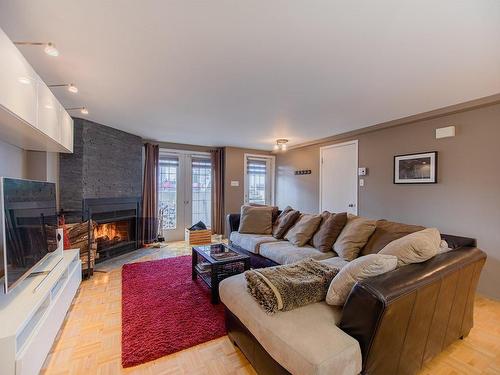 Salon - 127 Rue De La Futaie, Varennes, QC - Indoor Photo Showing Living Room With Fireplace