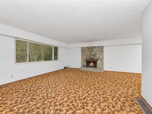 Lot 2-4696 Beckingham Rd, Metchosin, BC - Indoor Photo Showing Living Room With Fireplace